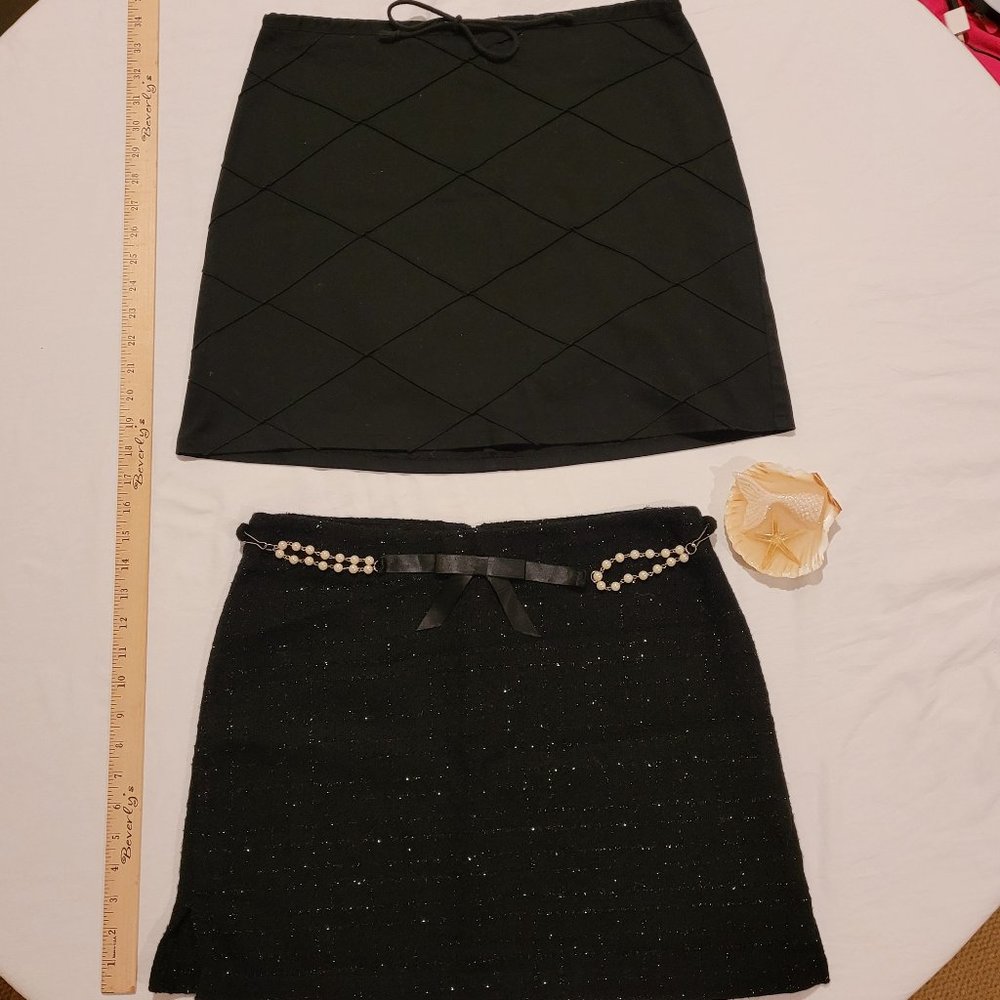 2 Black Mini Skirts by No Boundaries..... size 9 and 11.